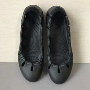 Black flats with elastic trim